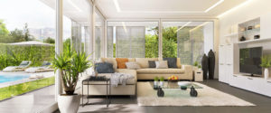 Interior design of a living room in a modern house with an open terrace and swimming pool