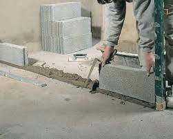 Monter mur parpaing